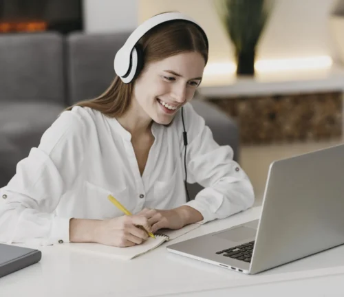 teacher-talking-with-her-students-online-scaled